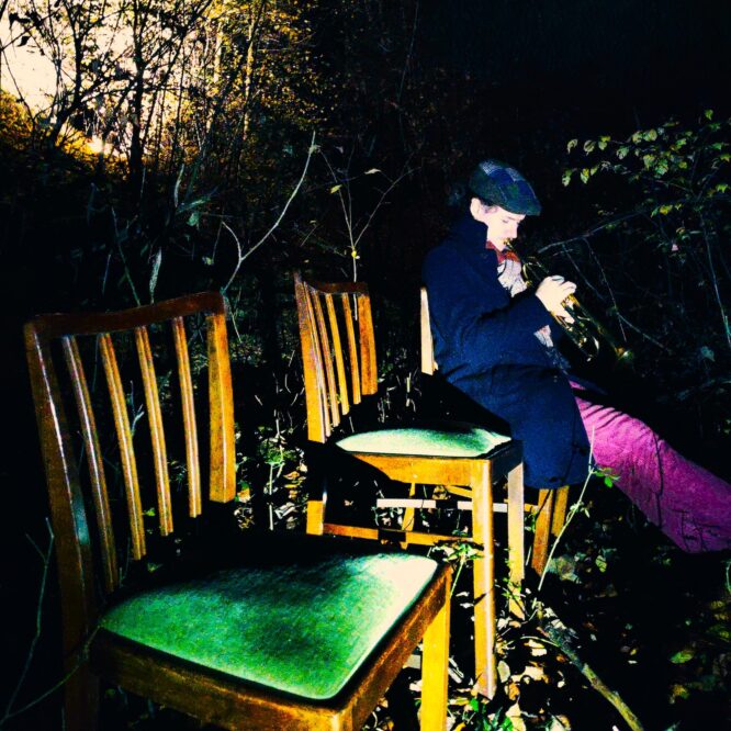 The waiting room. Mitgenosse on top of chairs in the forrest.